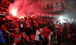 Supporters of USMA Algiers celebrate their victory in the CAF Confederation Cup final 25/2...