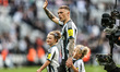 Kieran Trippier of Newcastle United waves to the fans during the lap of honour at the Prem...