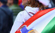A woman participates in a rally to commemorate National Patriot Day, which celebrates Queb...