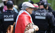 An elderly man participates in a rally to commemorate National Patriot Day, which celebrat...