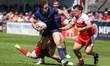 Elliot Wallis moves through the Sheffield defense during the BETFRED Championship match be...