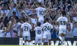 Tom Cairney of Fulham celebrates scoring his team's second goal during the Premier League...