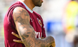 Callum Wilson of West Ham United warms up prior to the Premier League match between West H...