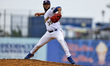 Brooklyn Cyclones relief pitcher Juan Arnaud #35 throws a pitch during the sixth inning of...