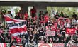 Fans of Dinamo Bucuresti attend the round 10 Romania Superliga Play Off match between Univ...