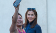 Queen Mary of Denmark poses for a selfie while attending the Royal Run in Copenhagen, Denm...