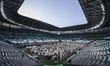 Muslim worshipers perform Eid al-Adha morning prayers at the Education City Stadium in Doh...