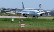 An Air Canada aircraft taxis for departure on the runway at Toronto Pearson International...