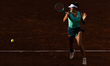 Solana Sierra competes in her women's singles match against Jasmine Paolini on day 4 of th...