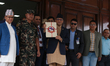Nepal's Finance Minister Swarnim Wagle poses for a photo at the entrance of the ministry a...
