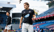 Oliwier Wojciechowski warms up before the game between Wieczysta Krakow and Polonia Warsza...
