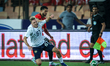 Mohamed Abdelmonem of Egypt competes for possession with Maksim Glushenkov of Russia durin...
