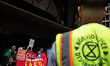 Climate activists from a coalition of groups protest outside JPMorgan Chase & Co. headquar...