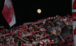 The moon is visible above the AC Monza supporters during the Serie B match between AC Monz...
