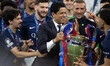Paris Saint-Germain president Nasser Al-Khelaifi celebrates winning the UEFA Champions Lea...