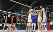 Italy celebrates after scoring during the friendly volleyball test match between Italy and...