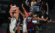 Julie Allemand of the Toronto Tempo and Mackenzie Holmes of the Seattle Storm compete for...