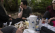 An Iranian family enjoys a picnic in the countryside near the city of Lahijan, in Gilan Pr...