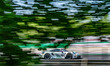 Bastian Buus, Thomas Preining, and Ricardo Feller drive the (#80) Porsche 911 GT3 R EVO of...