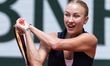 Anastasia Potapova competes in her women's singles match against Anna Kalinskaya on day 9...