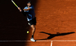 Matteo Berrettini competes in his men's singles match against Juan Manuel Cerundolo on day...