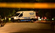 Suffolk County Police work at the scene where two people are shot overnight in the area of...