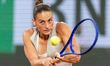 Marta Kostyuk competes in her women's singles match against Elina Svitolina on day 10 of t...