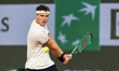 Jakub Mensik competes in a men's singles match against Joao Fonseca on day 10 of the Frenc...