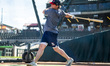 Jay Harry of the New Hampshire Fisher-Cats warms up before a Minor League Baseball game at...