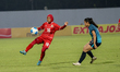 Indonesian national team player Rosdilah Siti Nurrohamah dribbles the ball during the matc...