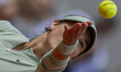 Anna Kalinskaya serves against Maja Chwalinska during the Roland Garros Grand Slam Tournam...