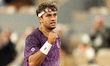 Flavio Cobolli reacts during his men's singles match against Felix Auger-Aliassime on day...
