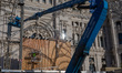 Workers assemble an image of Christ in Plaza de Cibeles, Madrid, Spain, on June 6. Madrid...