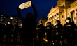 People participate in a Ni Una Menos demonstration outside the National Congress in Buenos...