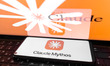The Claude Mythos logo appears on a smartphone screen, and the Claude AI logo displays as...
