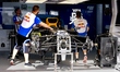 Mechanics work on the car of Formula 1 driver Liam Lawson of Visa Cash App Racing Bulls Fo...