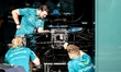 Mechanics work on the car of Formula 1 driver Fernando Alonso of the Aston Martin Aramco F...