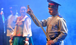 Members of the Moscow Cossack Choir perform during a concert conducted by Veniamin Novotoc...
