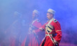 Members of the Moscow Cossack Choir perform during a concert conducted by Veniamin Novotoc...