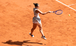 Marta Kostyuk competes in her semi-final women's singles match against Mirra Andreeva on d...