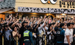 Onlookers take photos of Nvidia CEO Jensen Huang as he passes by the crowd in the Hongdae...