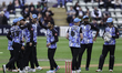 Worcestershire County Cricket Club players celebrate taking the wicket of Ben Kellaway of...