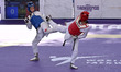 Yu-jin Kim of South Korea competes against Ella Brewster of Canada during the semi-finals...