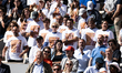 Mirra Andreeva's team is seen after the final women's singles match against Maja Chalinska...