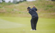 Kiradech Aphibarnrat of Thailand plays his second shot from the fairway of the 16th hole d...
