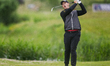 Joe Dean of England plays his second shot from the fairway of the 16th hole during the thi...