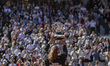Mirra Andreeva holds the trophy after the match at the Roland Garros Grand Slam Tournament...