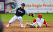 Joek Rivera of the Trenton Thunder tags Brodey Acres of the Williamsport Crosscutters duri...