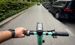 A rider uses a Bolt electric scooter on Paulinska Street in Krakow, Poland, on May 21, 202...