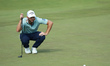 DUBLIN, OHIO - JUNE 07: Sam Burns lines up his putt on the 16th green during the conclusio...